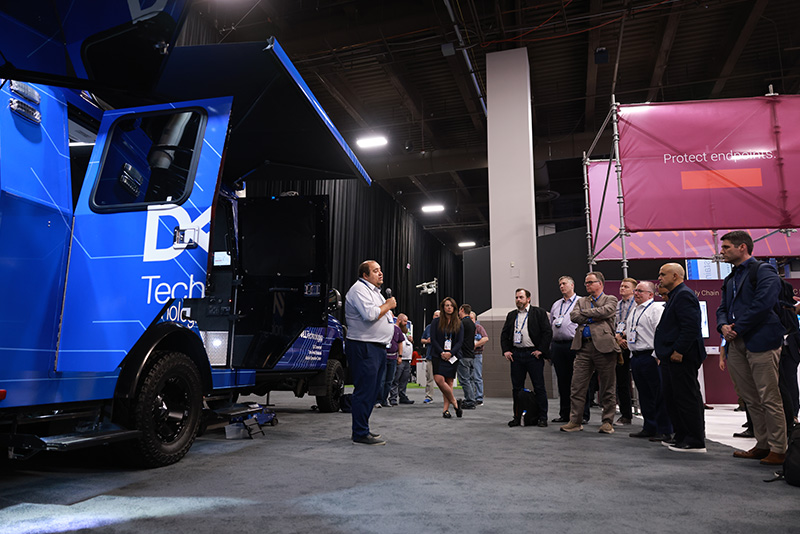 Dejero Founder, Bogdan Frusina, speaking to the crowd at Dell Technology World in front of the Project Fort Zero mobile operation center.