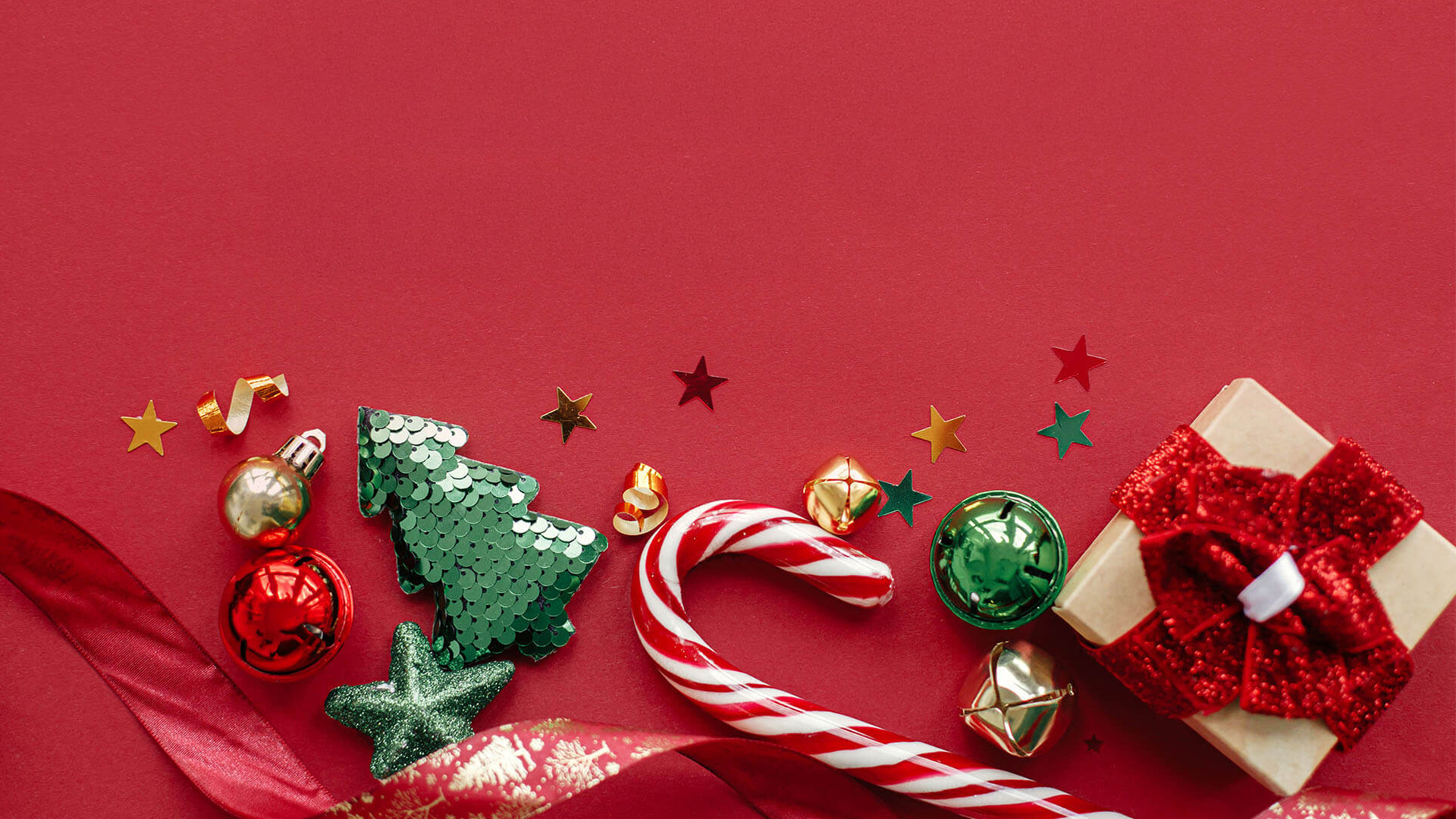 Holiday ornaments on a red background