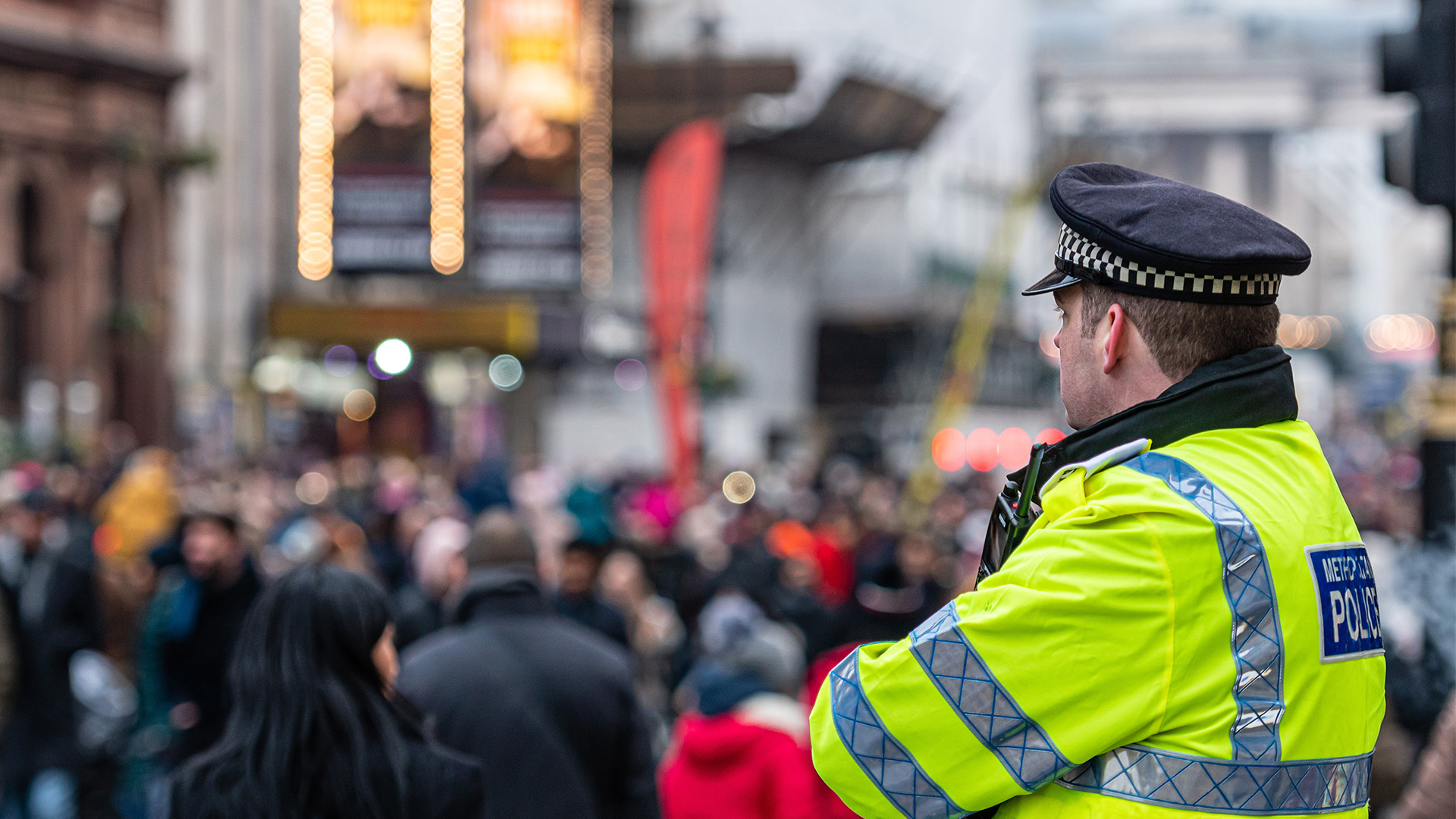 Police Officer watching a crowd