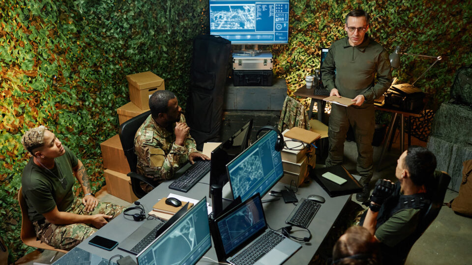 military personnel having a group discussion