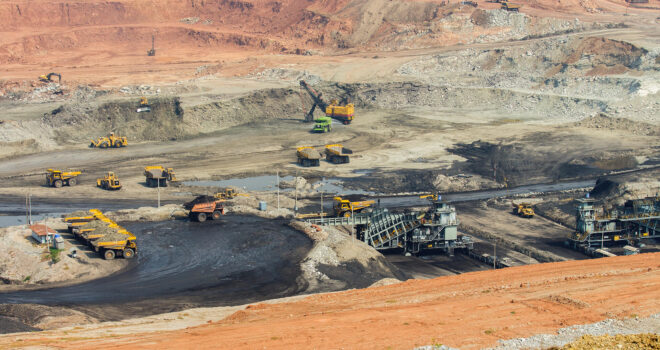 Part of a pit with big mining truck working