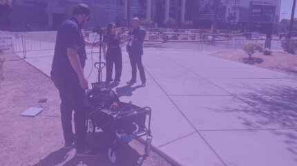 Dejero Team at NAB 2025 outside of the venue broadcasting