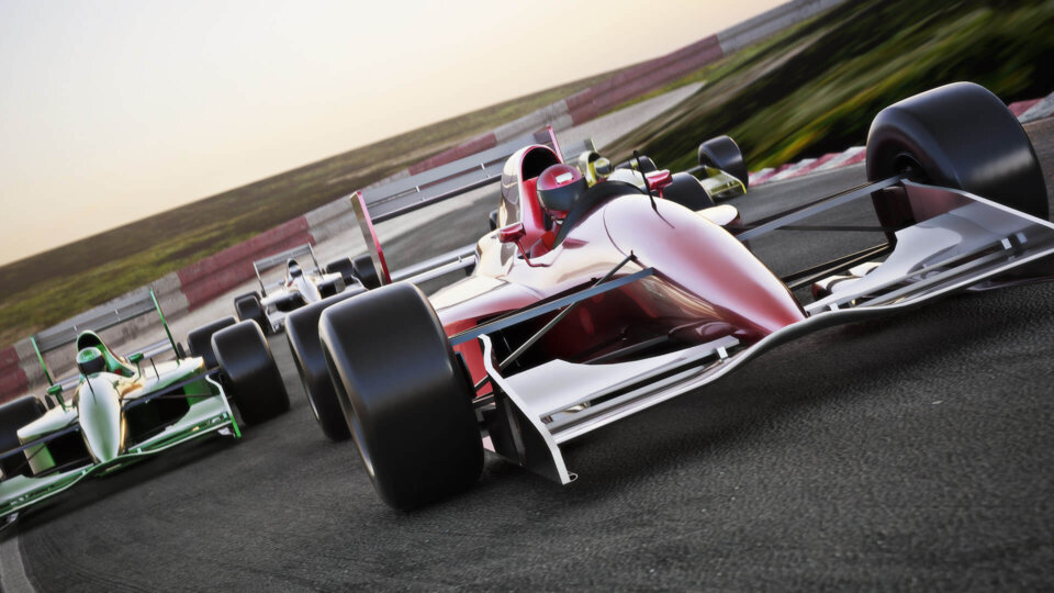 red race car close up front view on a track