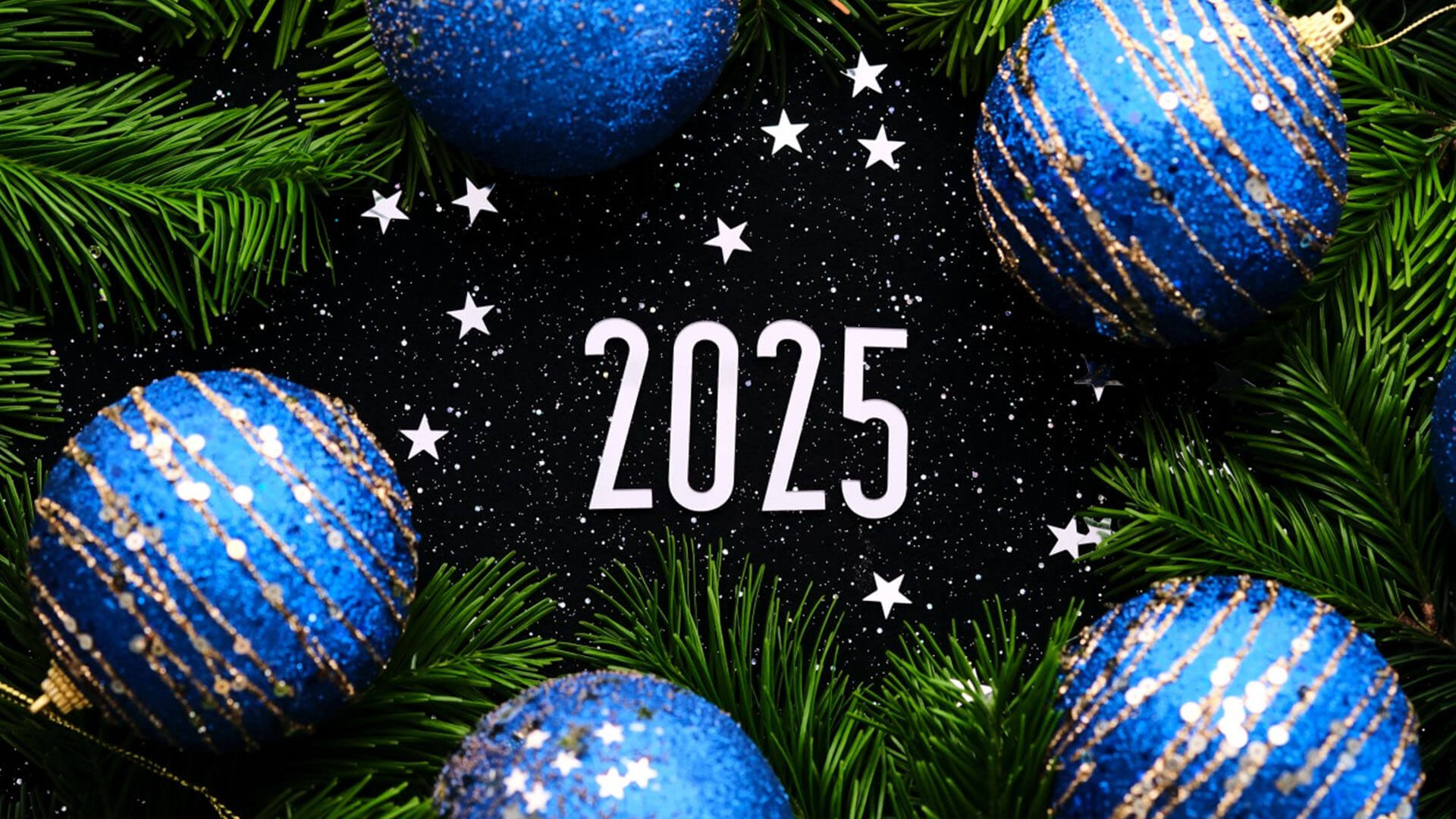 Holiday ornaments with 2025 overlayed