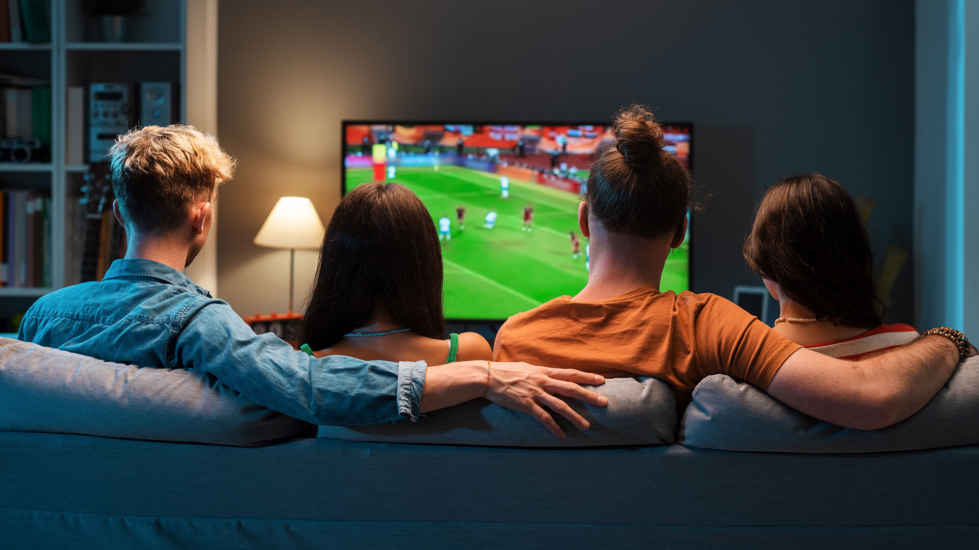 Couples watching soccer together