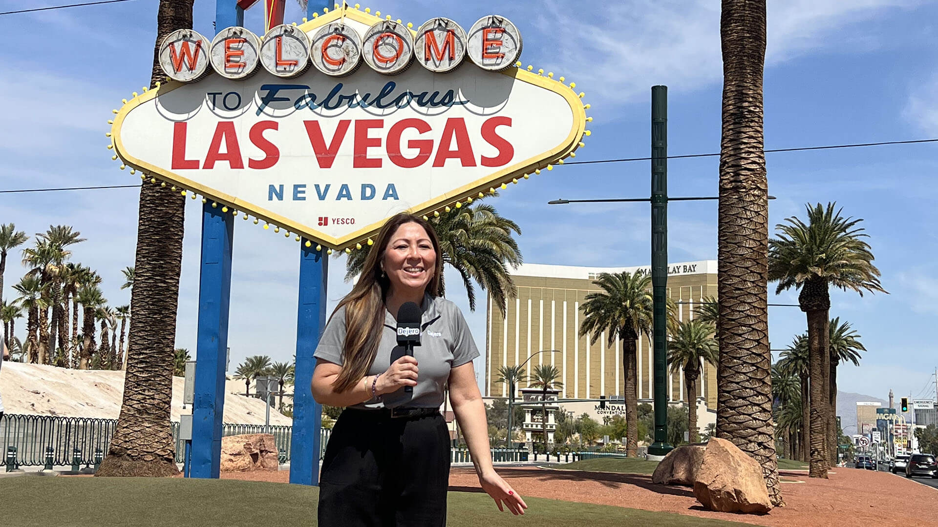 Ivy Cuervo in front of the famous Welcome to Fabulous Las Vegas sign