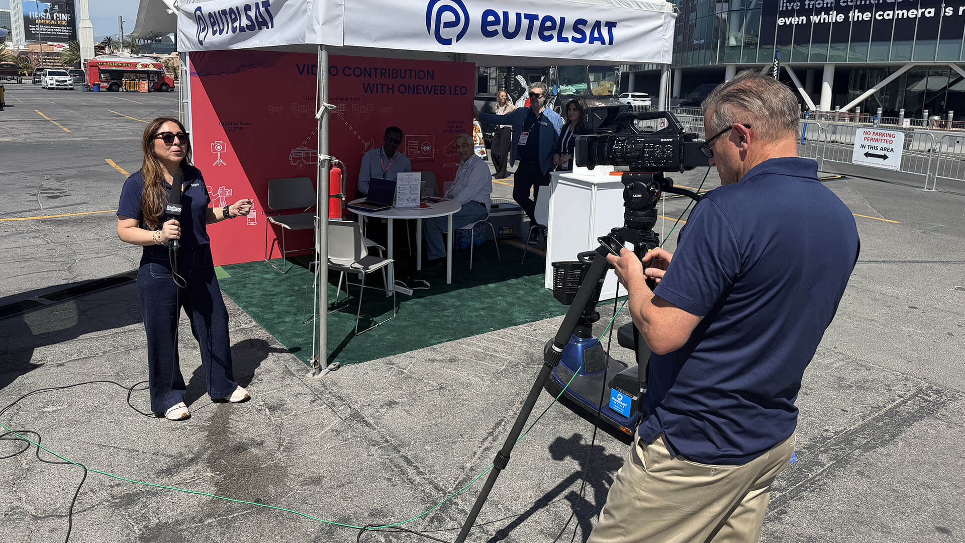 Dean Taylor recording the live stream with Ivy Cuervo presenting